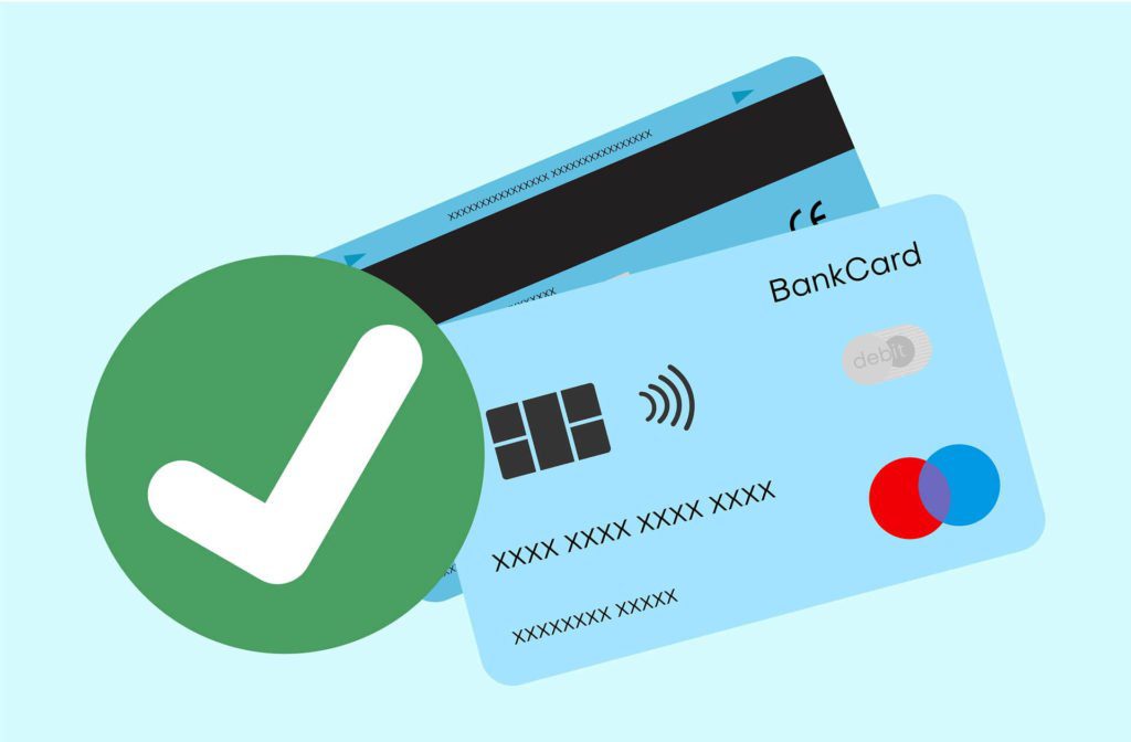 A Green check mark with credit cards on display