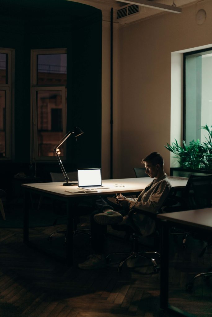 Screenshot of a man doing remote work time tracking tool with real-time reporting and analytics. Using remote productivity tools.