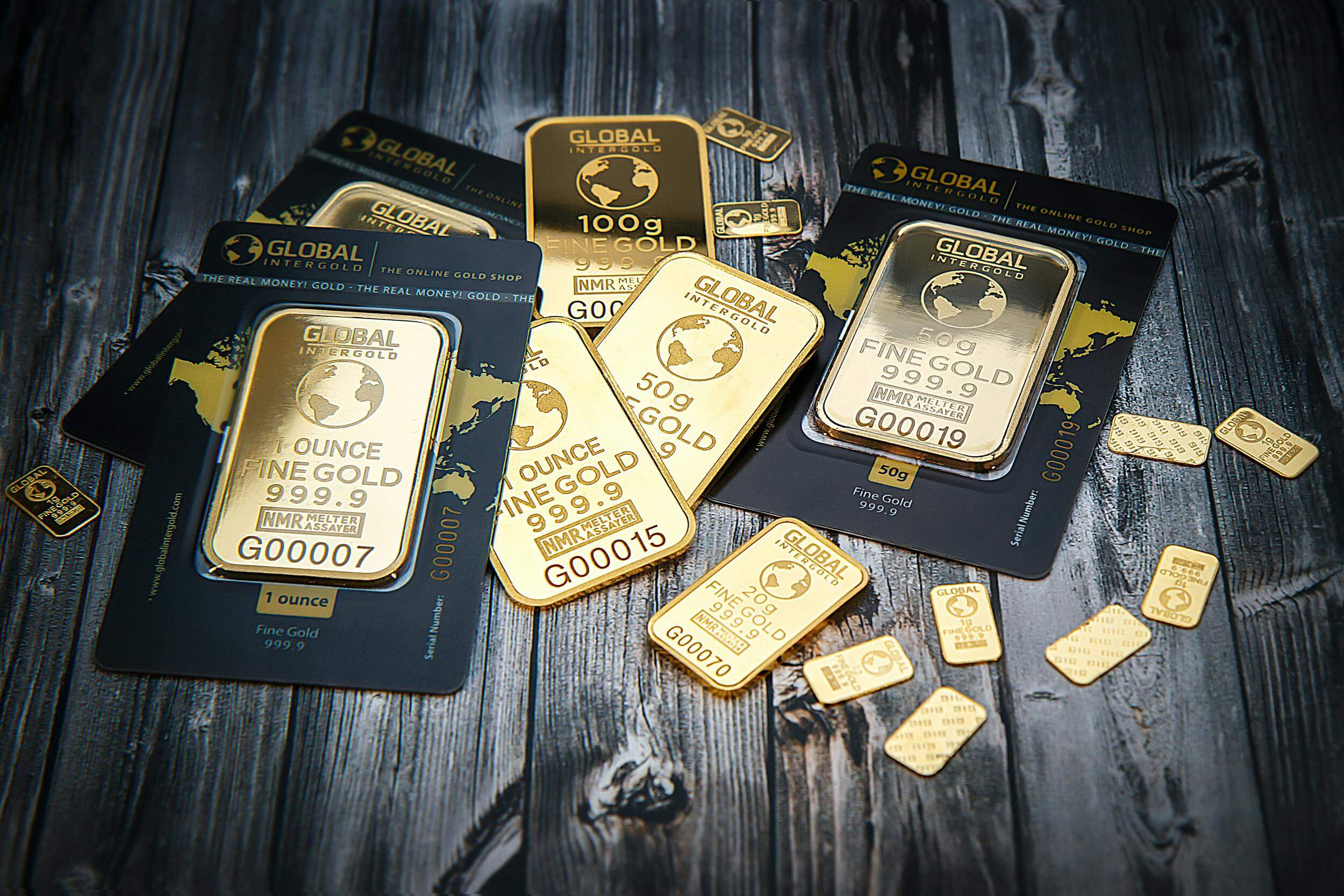 Tokenization benefits for credit unions-Gold laying on a wooden floor for tokenization